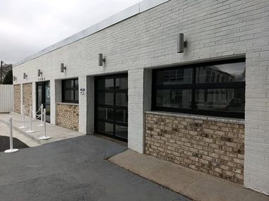 Garage Contractors — Commercial Glass Garage in Monroe, GA