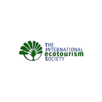 Logo of The International Ecotourism Society featuring a green stylized tree and the organization name in blue and green.