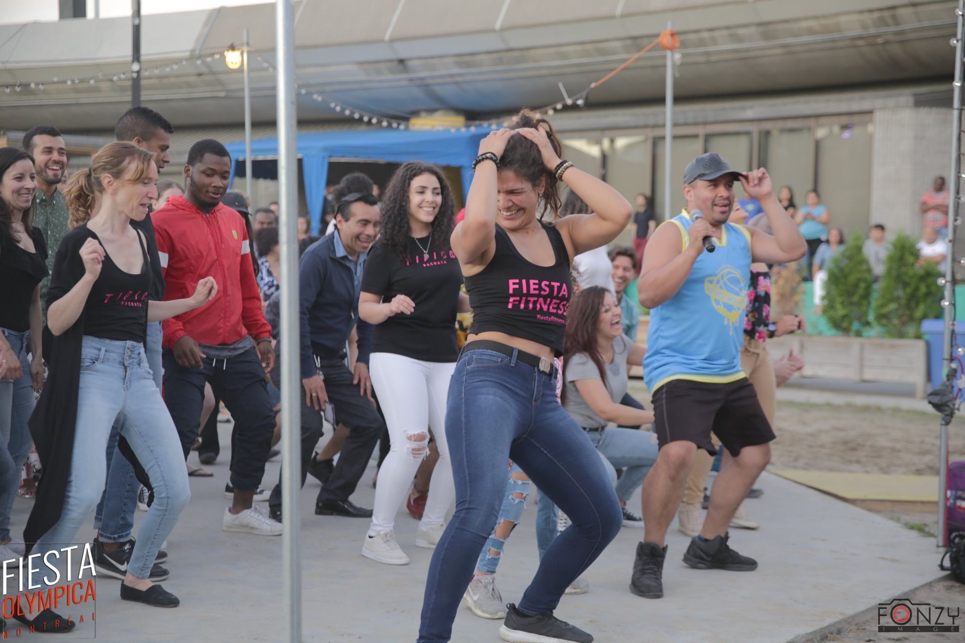 People dancing outdoors at a