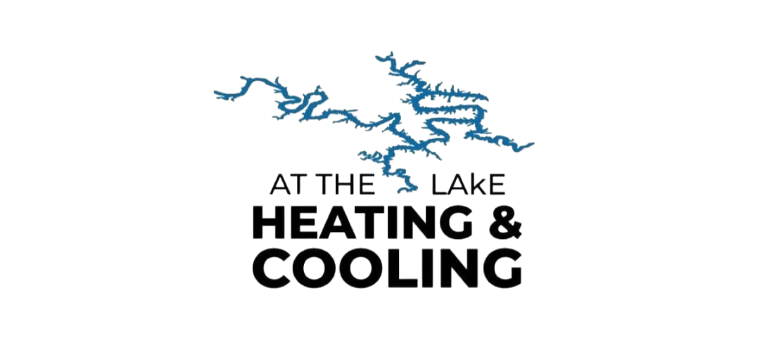 A logo for at the lake heating and cooling with a river in the background.