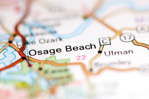 Close-up map showing Osage Beach and ULMAN in Missouri, with highways and a lake area.
