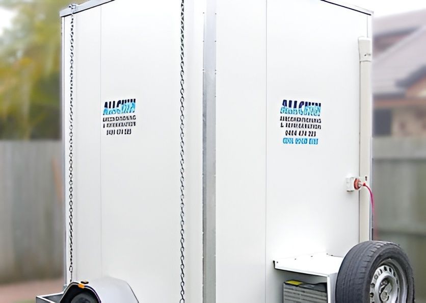A Person is Opening a Green and White Cooler Filled With Food and Drinks — Allchin Airconditioning & Refrigeration Electrical in Caloundra, QLD