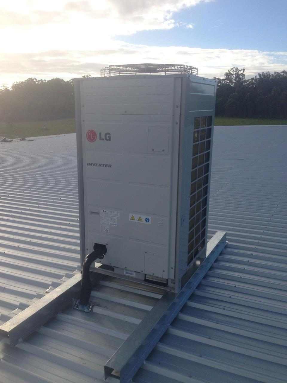 Lg Air Conditioning Unit on A Metal Roof — Allchin Airconditioning & Refrigeration Electrical in Caloundra, QLD