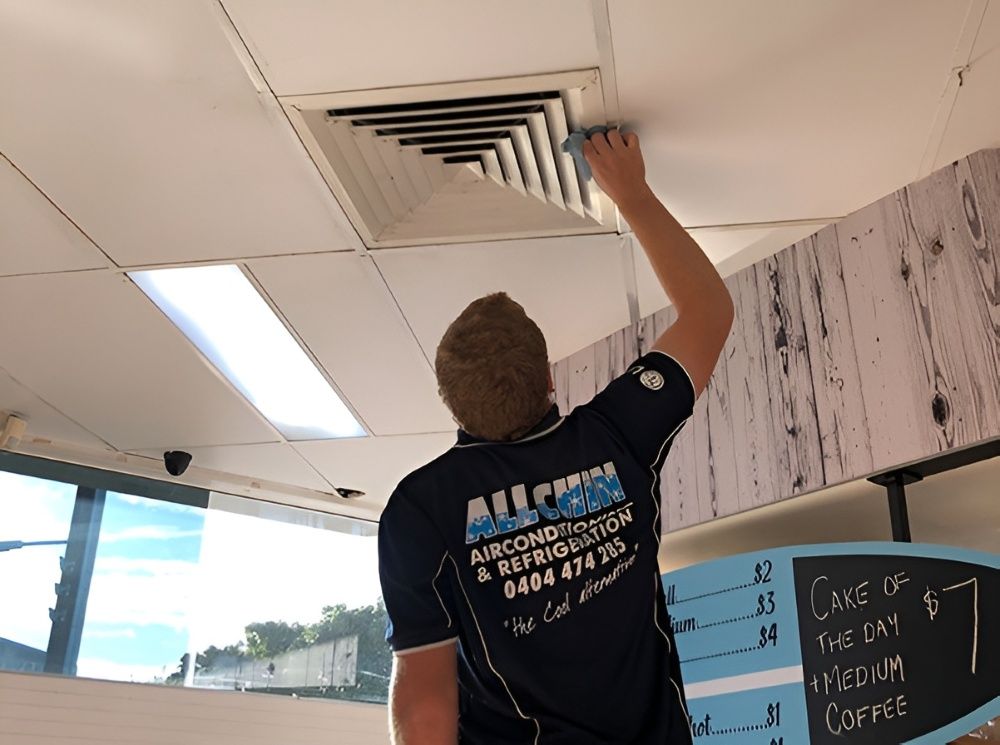 A Close up Of a Square Air Vent on A Ceiling — Allchin Airconditioning & Refrigeration Electrical in Caloundra, QLD