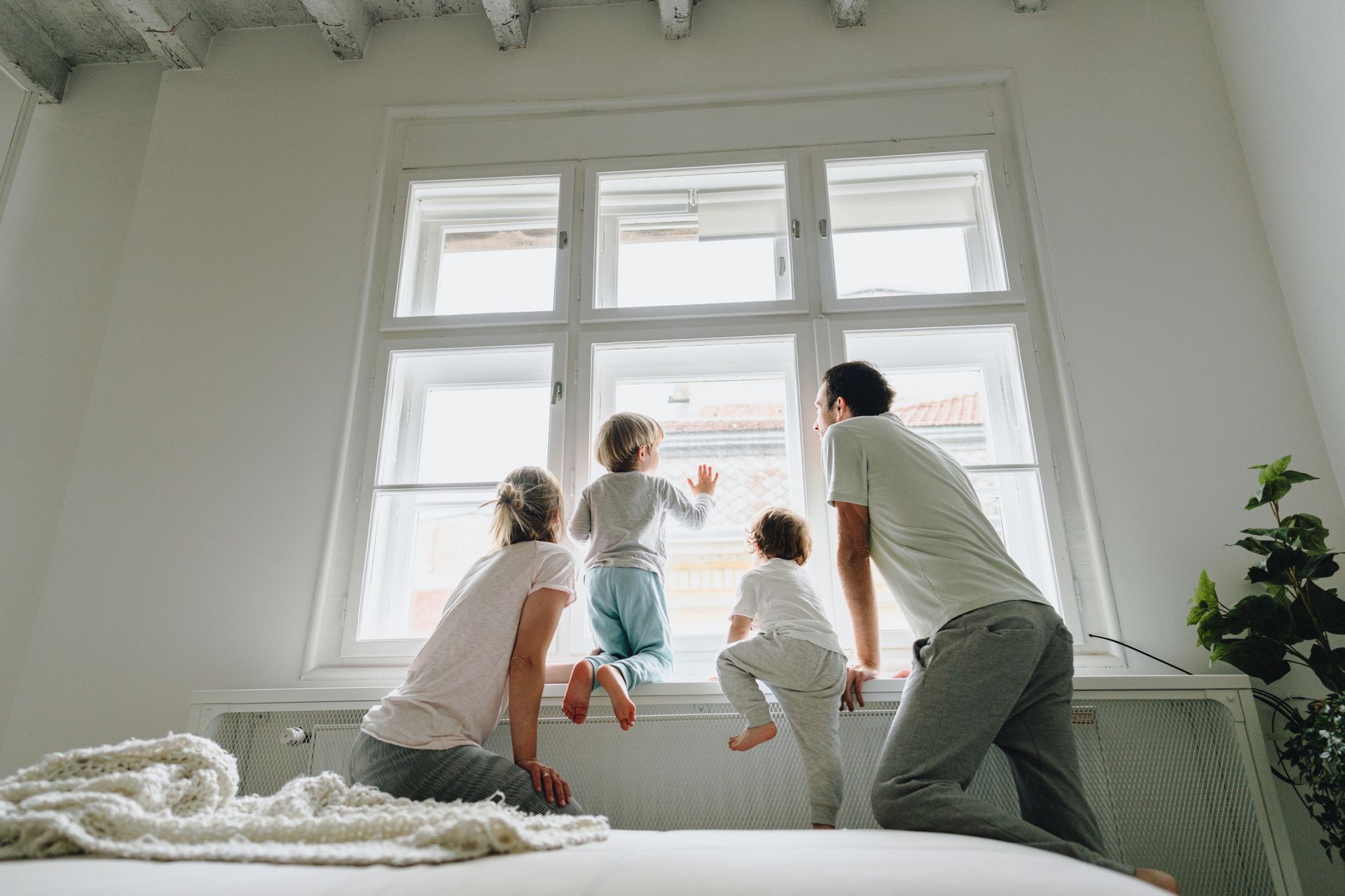 Family Staring At Their Window — Capital District, NY — Home Time Contracting