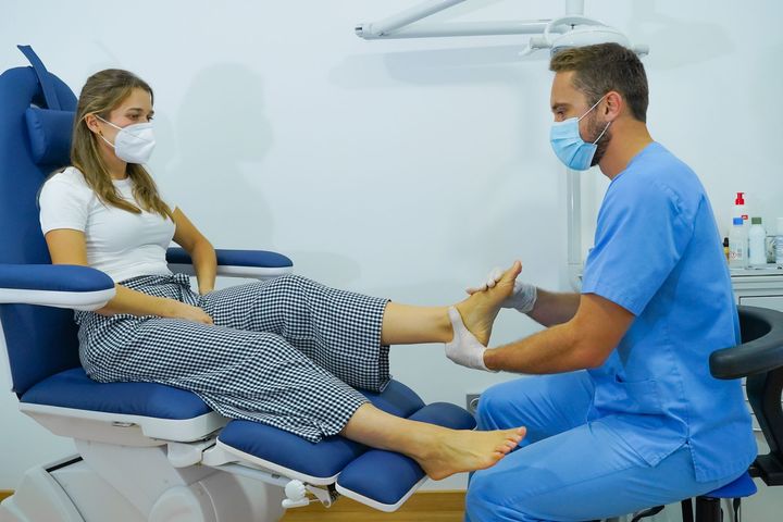 Woman Foot Examined By The Doctor — Cedar Rapids, IA — Podiatry Associates