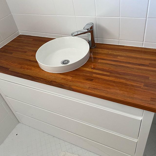 White Sink On Wooden Cabinet Top
