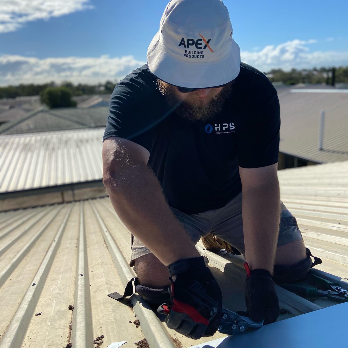 Worker Repairing Residential Roof
