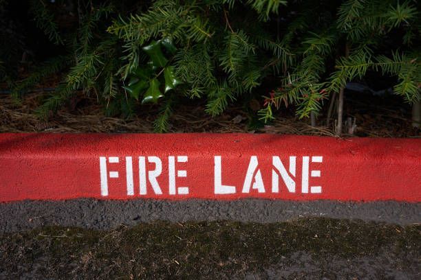 Painted fire lane curb markings.