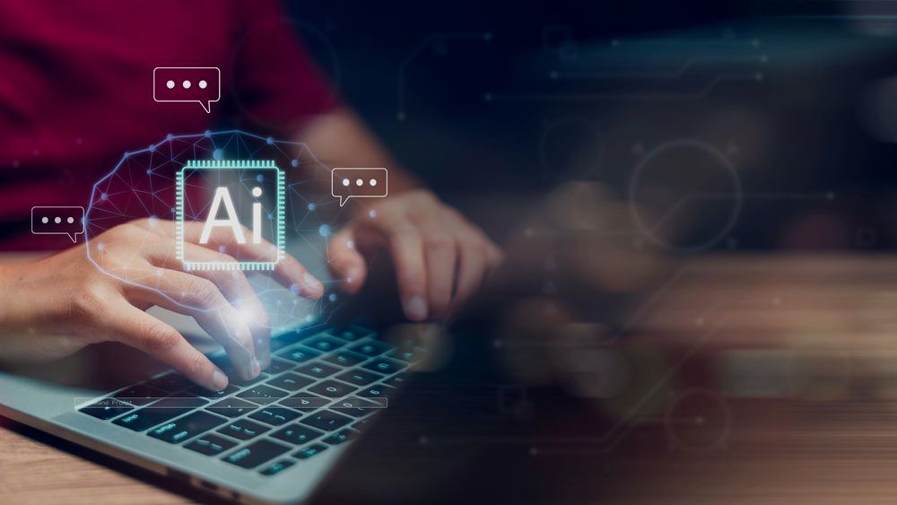 A person is typing on a laptop computer. A person is typing on a laptop computer.