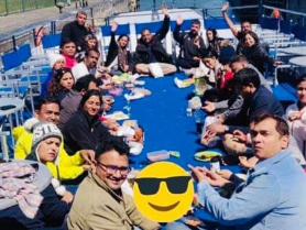 Picnic circle celebrating progress after an open-air couples coaching retreat