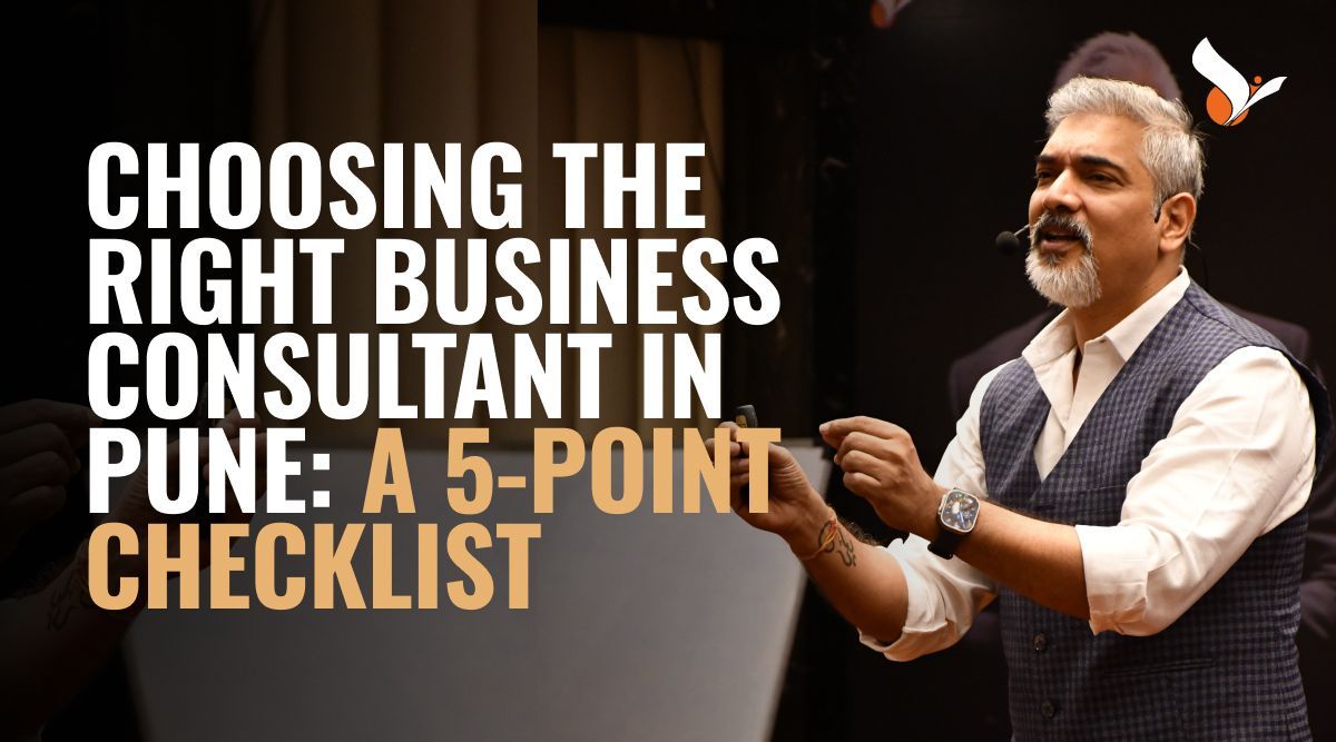 Business Consultant in Pune discussing strategy with startup founders