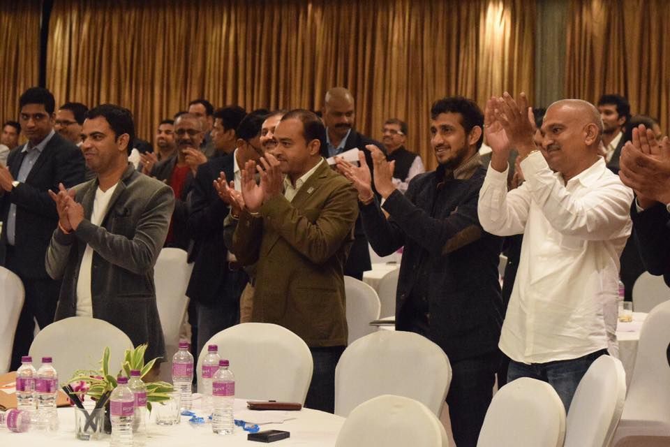 Standing ovation for a keynote on competitive advantage by a renowned business strategy consultant.
