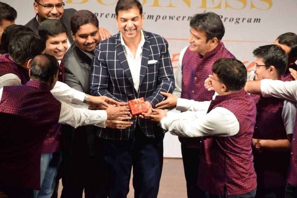 Group congratulating Manish Gupta, hailed as the best business coach in India, for his transformative session.