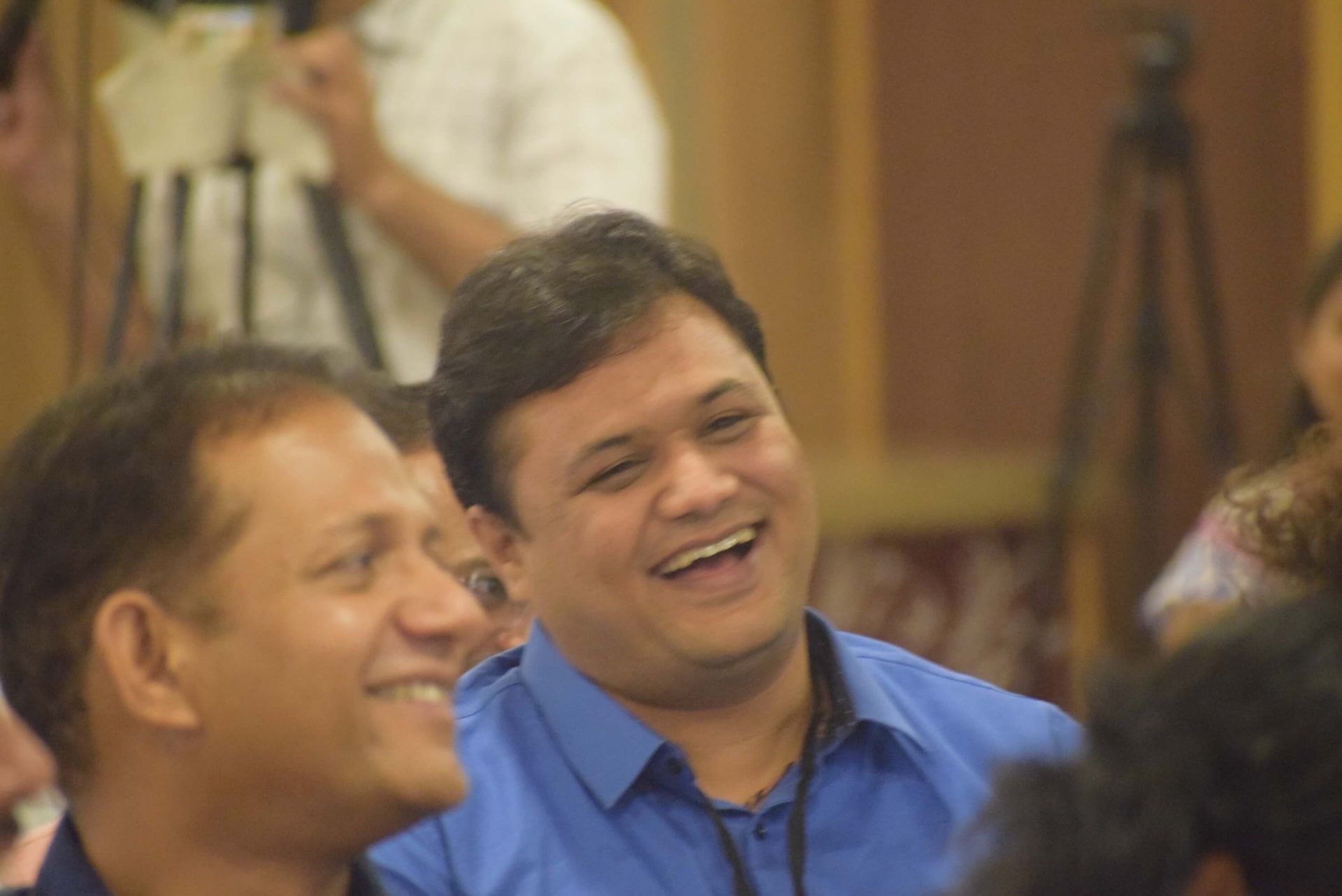People smiling with a life coach in Pune during a Life 360 session