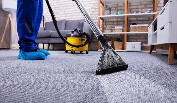 Cleaning Carpet With Vacuum Cleaner — Omaha, NE — Cano Complete Cleaning