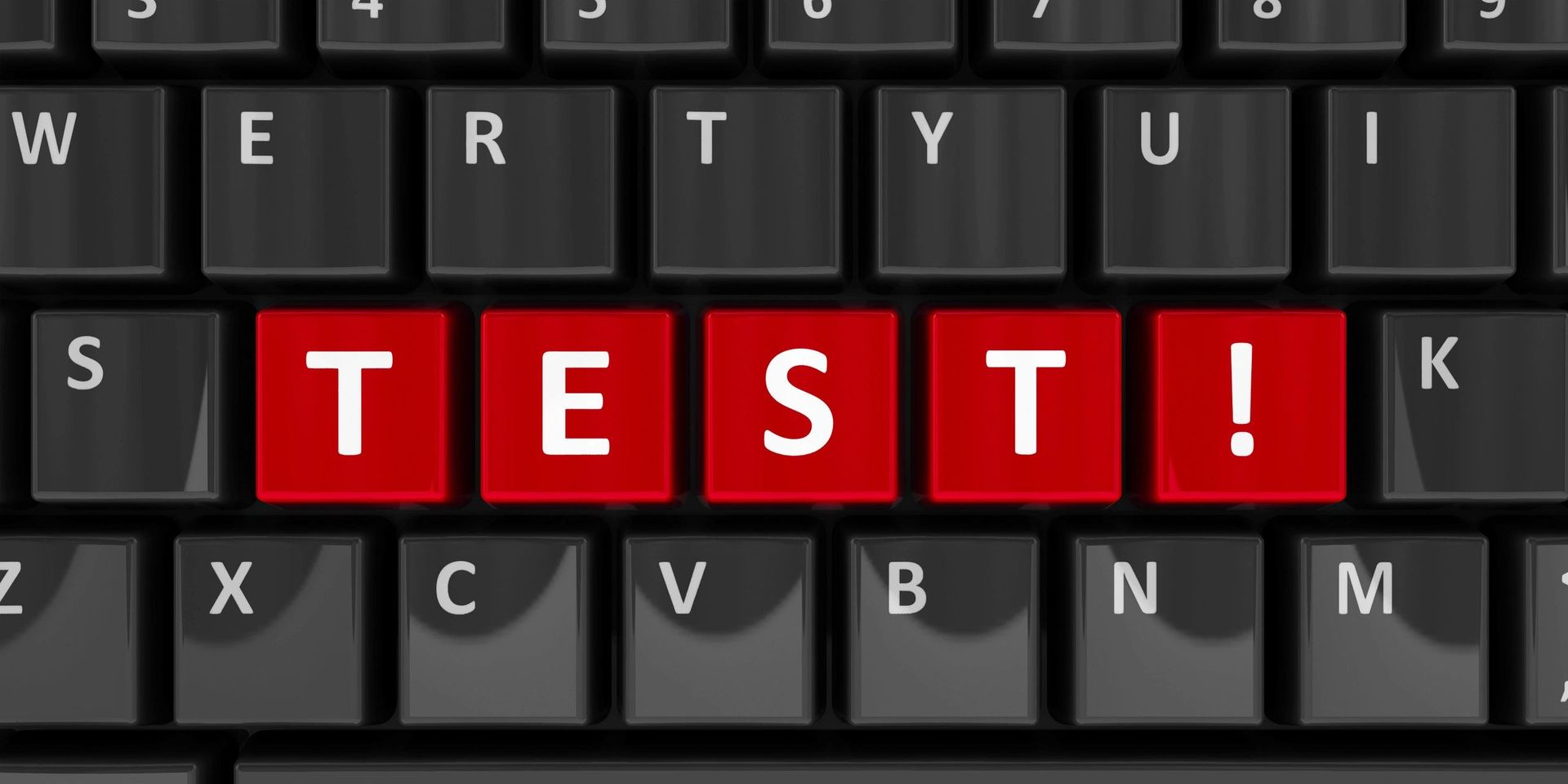 A black keyboard with red keys that say test