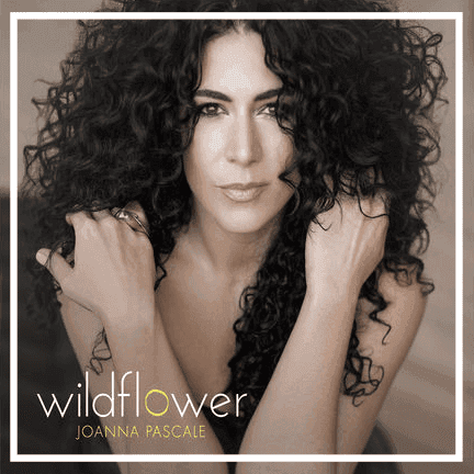 Whether referring to the lesser-known repertoire to which she’s drawn or to the singer herself, nurtured in the concrete jungle of her native Philadelphia, Wildflower is the ideal title for Pascale’s captivating new album. Supported by an excellent band led by the session’s producer, pianist Orrin Evans, and a host of special guests including Christian McBride, Kurt Rosenwinkel, Gregoire Maret, Bilal, and Cyrus Chestnut, Pascale finally comes into full bloom, a wildflower whose beauty is emerging into the sunlight.  The recording of Wildflower coincided with the end of Pascale’s decade-long engagement at the Loews Philadelphia Hotel, which allowed her to hone her voice, style, and vast repertoire. But leaving that long-running gig also provided a newfound freedom to follow a more personal path, which she embraces on her fourth album. Each song on Wildflower is one with which Pascale feels a deep emotional connection, which shines through in the passionate feeling she conveys to the listener. “If I don't connect with a lyric, I can’t sing the song,” she says. “I love to dig into the words and find all the different shades, the stories within the story, and then try to interpret that.”   But equally important for her approach to breathing life into this material is Pascale’s interaction with her musicians. “For me,” she says, “it's the space between the words that tells the story. I love that these musicians allowed so much space for me to paint these pictures. It allowed me to get very intimate with the phrasing of the lyrics. The fun in storytelling is finding a way of phrasing so that the listener connects to your intention and all the ways you feel the subtle shades of the emotions in the story.”   Propelled by the deep, sinuous groove laid down by Evans, McBride, and drummer Donald Edwards, “Forget Me” immediately establishes that connection via Pascale’s intimate, impassioned delivery. It’s followed by the tender J.J. Johnson ballad “Lament,” featuring an original lyric penned for Pascale by Tony Haywood, which features Edwards and bassist Luques Curtis. Most of the album features bassist Vicente Archer and drummer Obed Calvaire, who luxuriate in creating space while maintaining momentum on tracks like “I Remember You” and “Stay With Me.”   To find the ideal musicians to realize her vision for the album, Pascale worked closely with producer Orrin Evans. The two go back almost twenty years together, to her near-disastrous first experience on stage when she was 14 at an Evans-led jam session. When the pianist finally called her to the stage, he waved off her offer of a songbook with the music for Billie Holiday’s “Good Morning Heartache.”“This was honestly the first time I’d ever sang when I wasn’t singing along to a record,” Pascale recalls. “Orrin starts playing and something wasn’t right. I start singing and he’s in a different key, and I’m horrified. So I turn around and the bassist and drummer are laughing hysterically to the point where tears were rolling down their faces and their shoulders were shaking trying to hold it in. Next thing I know, somebody grabs the songbook and puts it in front of Orrin. I still have a little bit of fear whenever I sit in on a jam session.”  Despite that shaky start, Pascale and Evans forged an ongoing friendship, to the point where they consider themselves virtually family. “Joanna’s like a little sister to me,” Evans has said. “I think we really feel time and space and rhythm in the same way. So whatever we do, there’s going to be space for us to grow and make something happen.”  As a producer, Pascale says, Evans “knew exactly what I wanted to get to and I really trusted that. There were times where it was hard for me to give up control, because I had total control of all the other records that I’ve done. But he really had the wider vision than I did at the moment, which helped to shape everything. We have a lot of mutual respect.” Gregoire Maret’s expressive harmonica highlights two rare excursions into the pop songbook for Pascale, Stevie Wonder’s “Overjoyed” and the Gerry Goffin/Carole King favorite “Will You Still Love Me Tomorrow?” Maret also appears, along with Cyrus Chestnut’s spirited organ, on Pascale’s achingly slow rendition of Henry Glover’s “Drown in My Own Tears,” best known from Ray Charles’ recording. The title song, meanwhile, features two of Philadelphia’s favorite six-string sons, Kurt Rosenwinkel and Tim Motzer, and vocals by neo-soul singer Bilal, Pascale’s friend from Philly’s renowned High School for the Creative and Performing Arts (CAPA), which also boasts Rosenwinkel, McBride, Joey DeFrancesco, and member of The Roots as graduates. “We started discovering music together,” Pascale recalls of Bilal. “We would make each other jazz vocal mixtapes and trade them. So it was a very special, very magical moment for me to have him share his gift on the recording twenty years later.”    After graduating from CAPA, Pascale attended Temple University, where she is now a member of the faculty and has been featured on two of the university’s CD releases, including the Temple University Jazz Band’s Thad Jones tribute album To Thad With Love. She is featured on Warfield’s Jazzy Christmas CD; Orrin Evans’ Liberation Blues, recorded live at Smoke; on Philly sax legend Larry McKenna’s From All Sides; Jeremy Pelt's Soul and on That Music Always Round Me, a setting of Walt Whitman’s poetry by Garry Dial and Dick Oatts. She made her leader debut with 2004’s When Lights Are Low, followed by the 2008 CD Through My Eyes and a 2010 duo recording with pianist Anthony Wonsey that focused on Songbook standards.