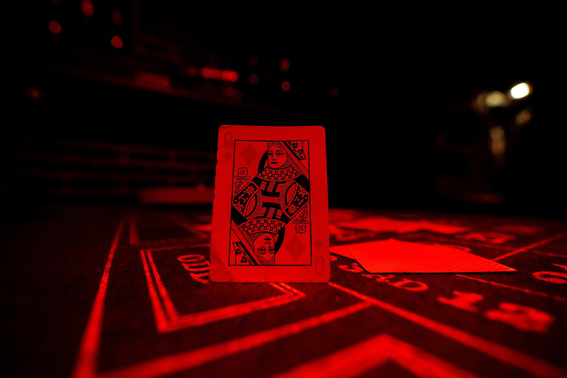 The joker card is a reference and a hint at the same time. But why in the picture 'Queen Ruby'?