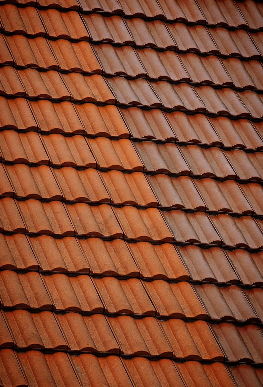 A close up of a clay tile roof.