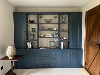 media center
bookcase
cd records
display cabinet
painted