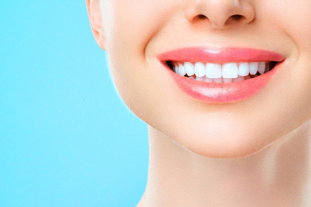 Woman Smiling with Healthy White Teeth