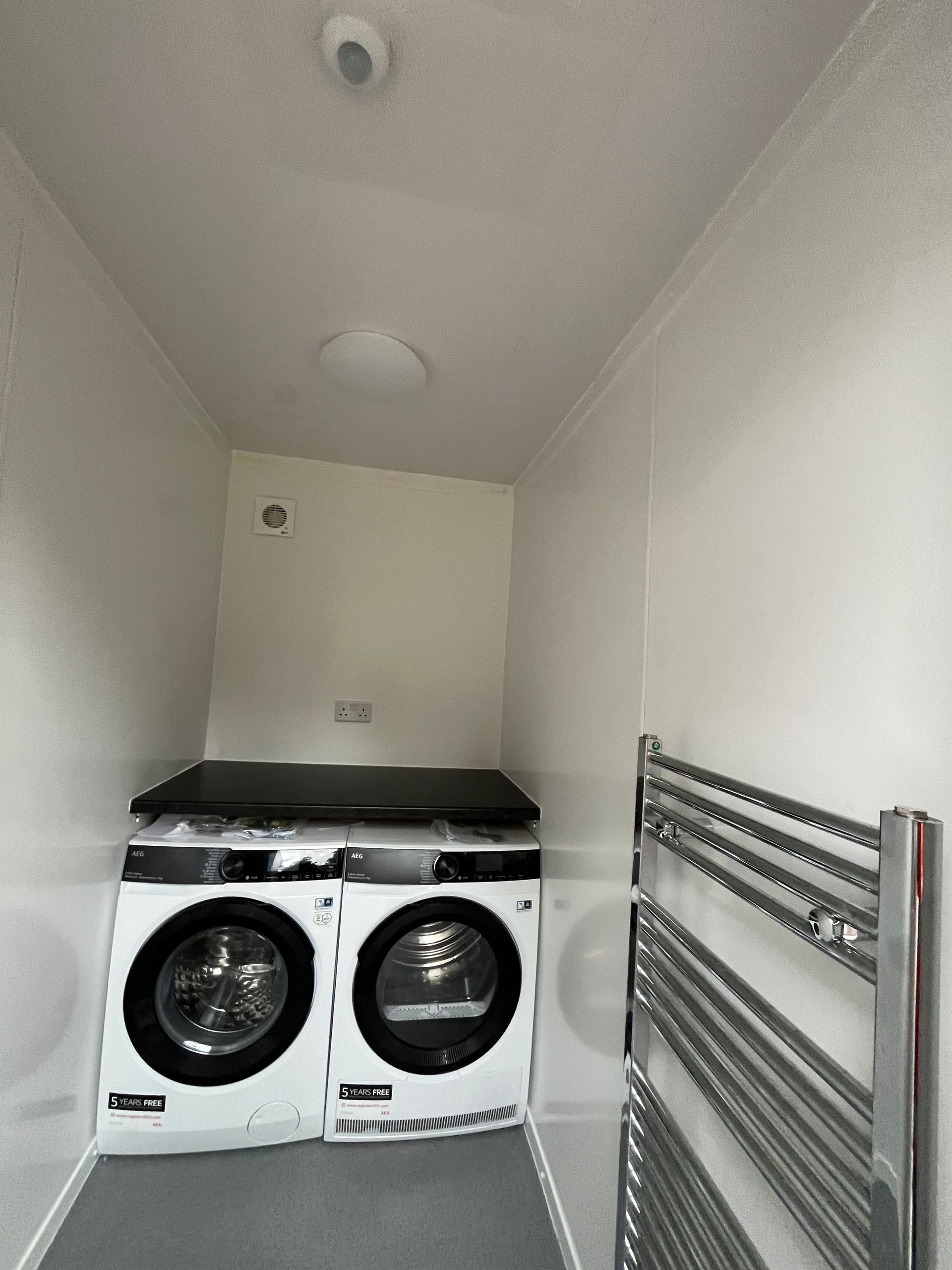 Part of a laundry, shower, and toilet facility for a homeless charity