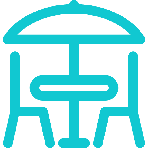 a blue icon of a table and chairs with an umbrella .