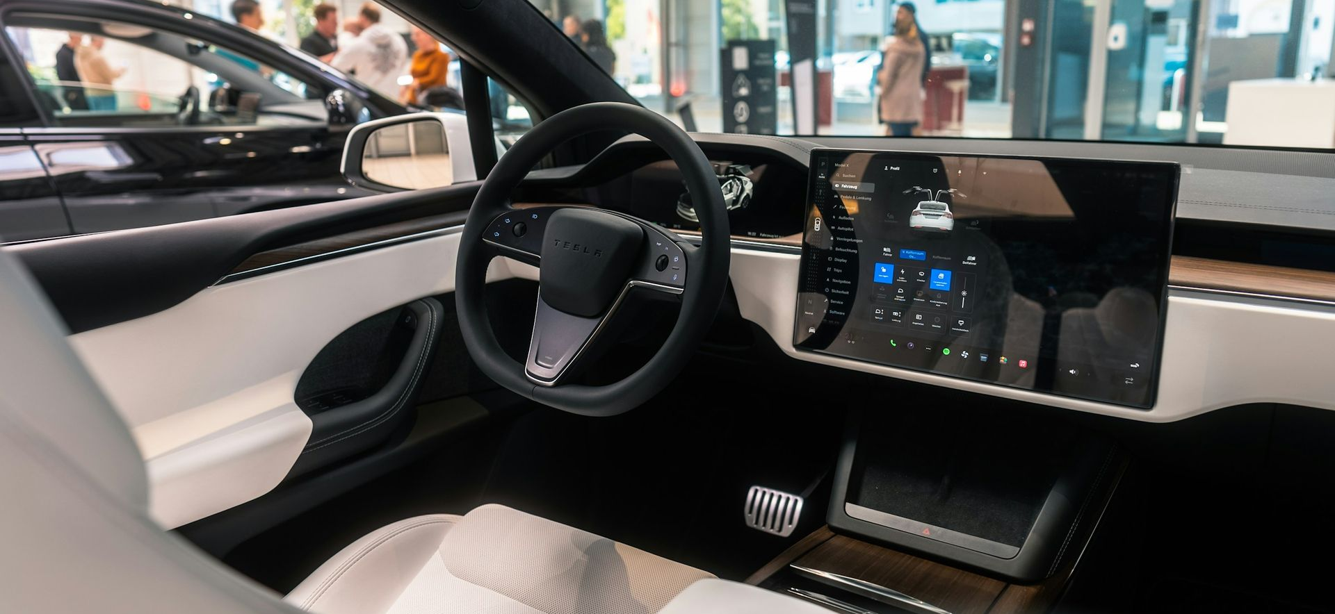 Wireless entertainment system inside a modern Tesla dashboard