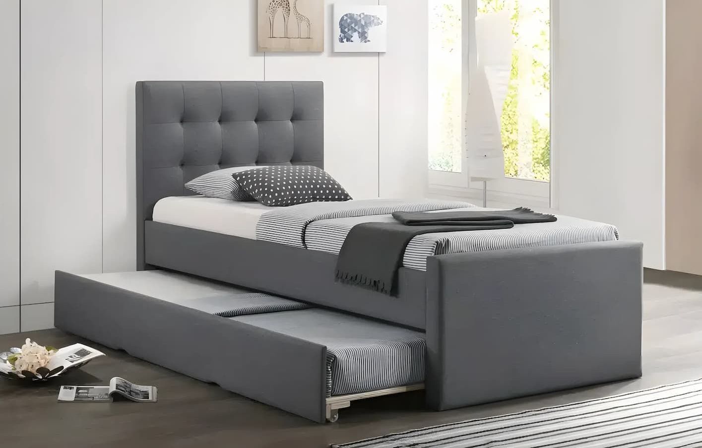 A Single Bed With a Trundle Underneath It in a Bedroom — Bryants Beds and Mattresses In Lismore, NSW