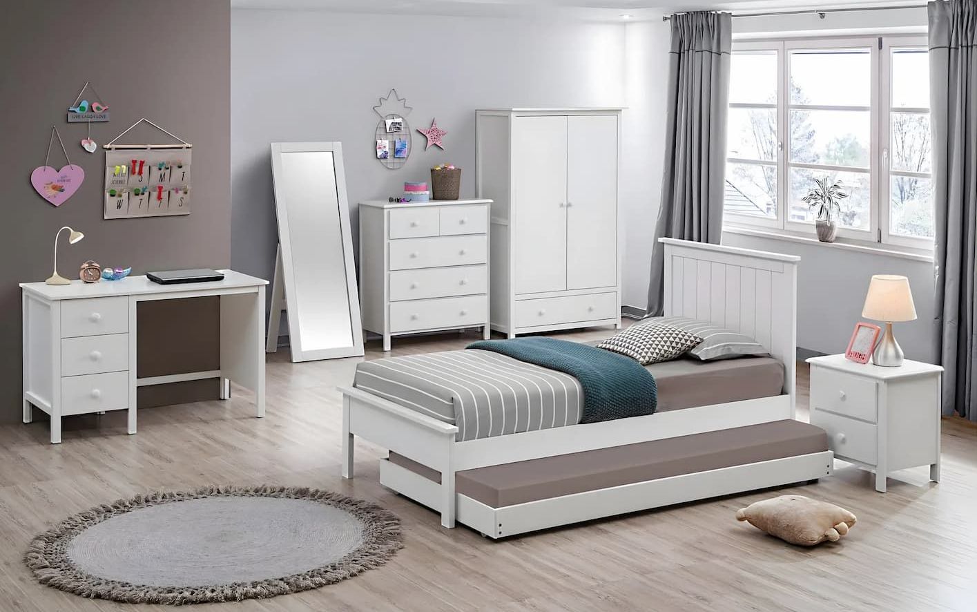 A Bedroom With a King Single Bed and a Desk — Bryants Beds and Mattresses In Lismore, NSW