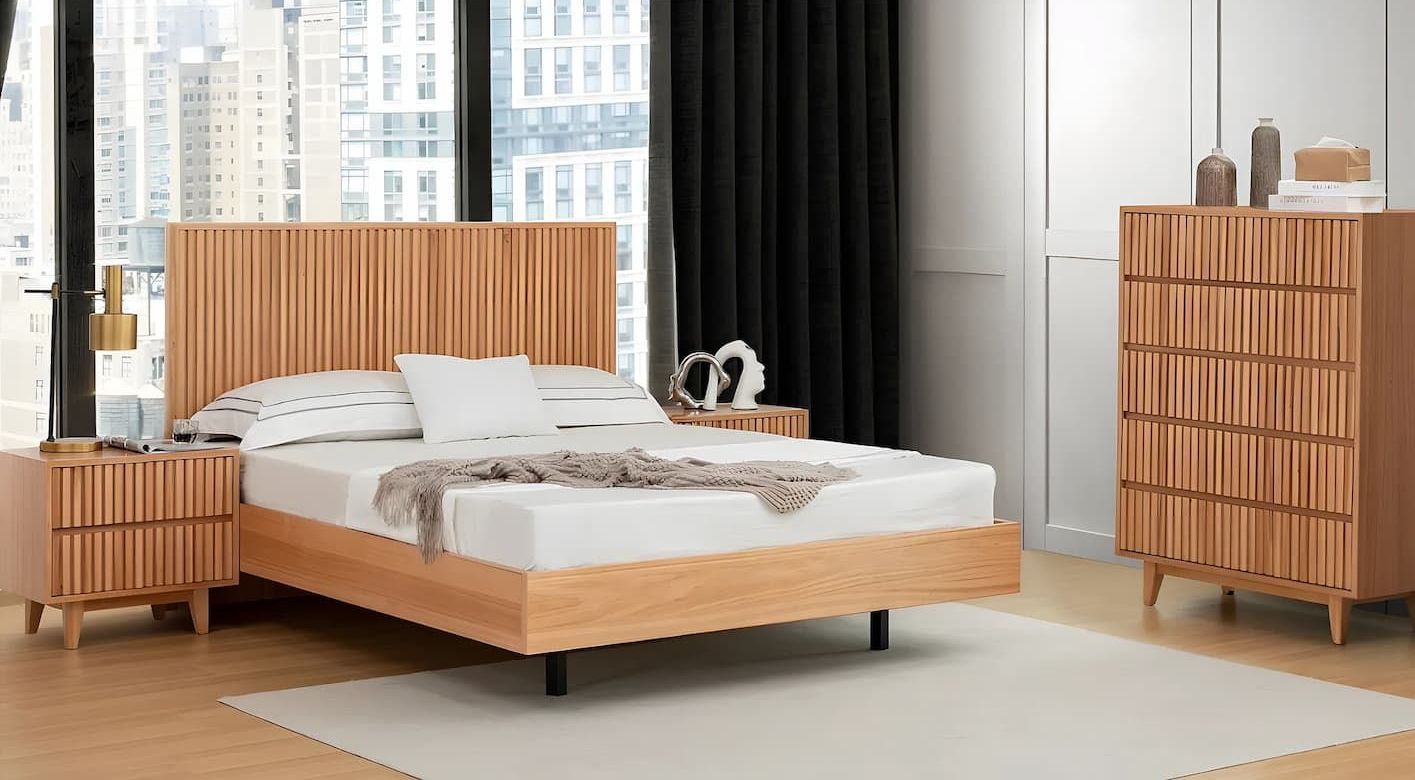 A Bedroom With a Bed, Nightstand, Dresser, and Rug — Bryants Beds and Mattresses In Lismore, NSW