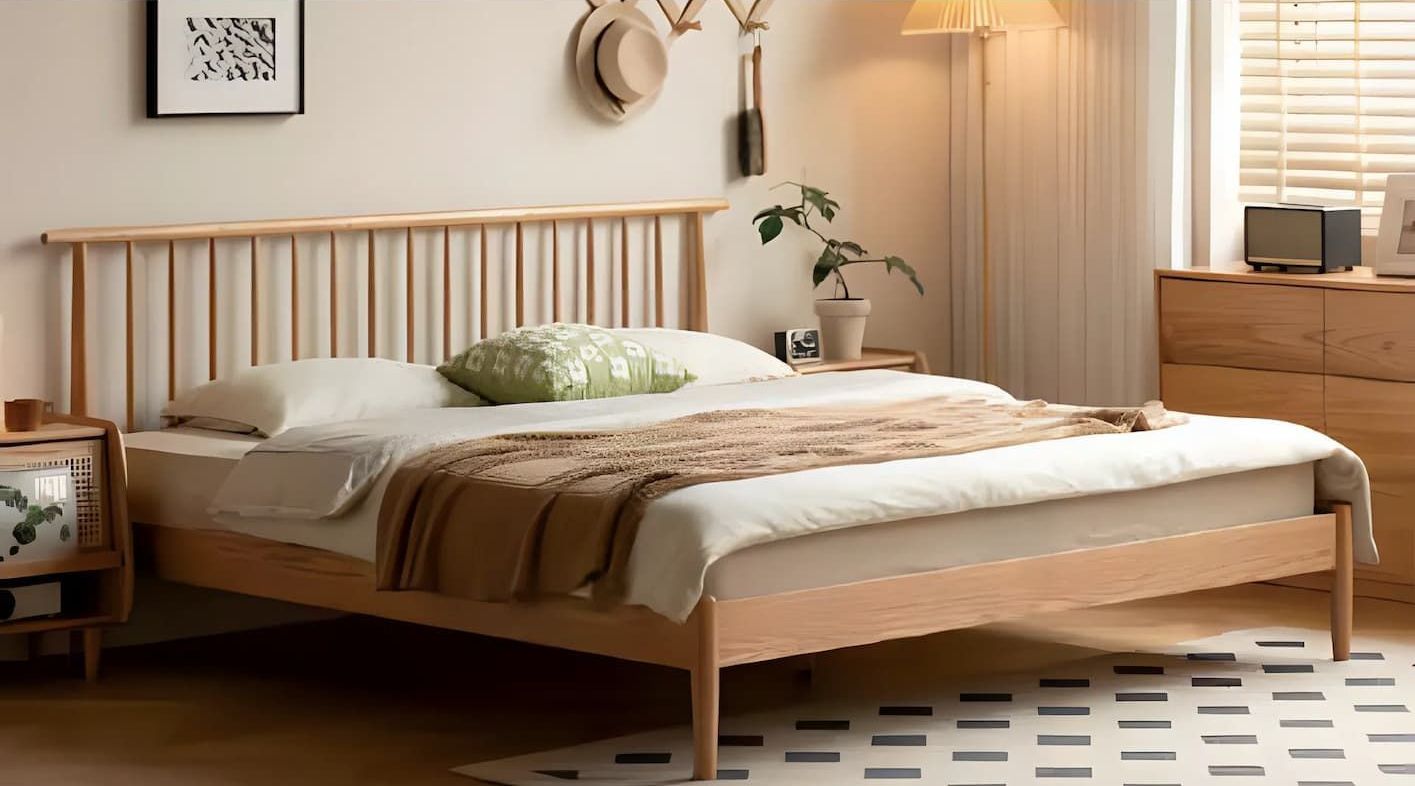 A Bedroom With a Bed, Dresser, Nightstand and Lamp — Bryants Beds and Mattresses In Lismore, NSW