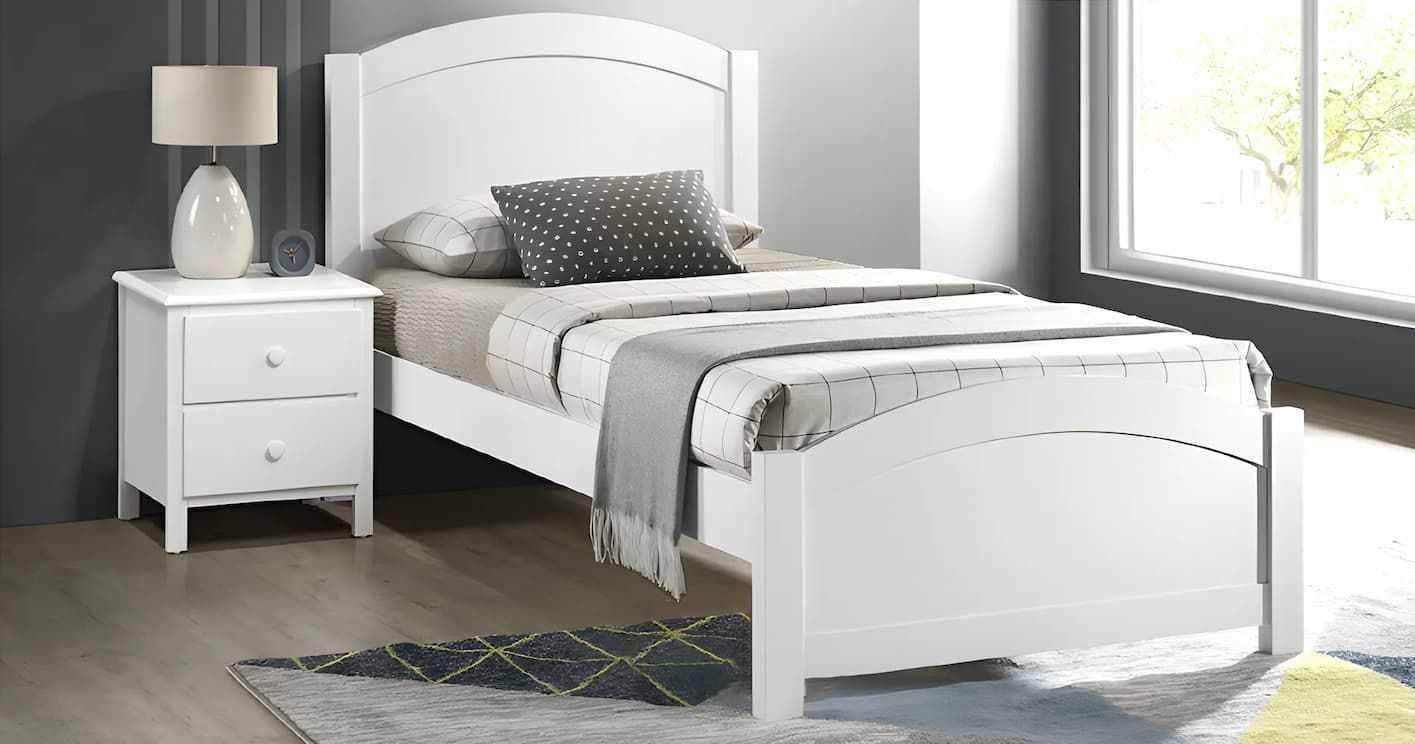 A Bedroom With a Bed, Nightstand, and Drawers — Bryants Beds and Mattresses In Lismore, NSW