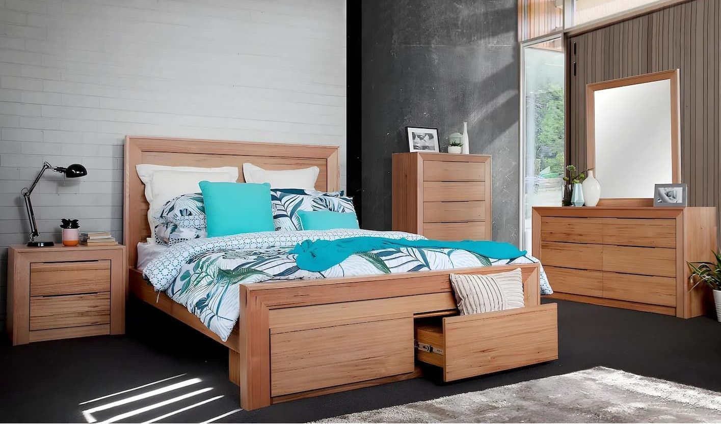 A Bedroom With a Bed Dresser Mirror and Nightstand — Bryants Beds and Mattresses In Lismore, NSW