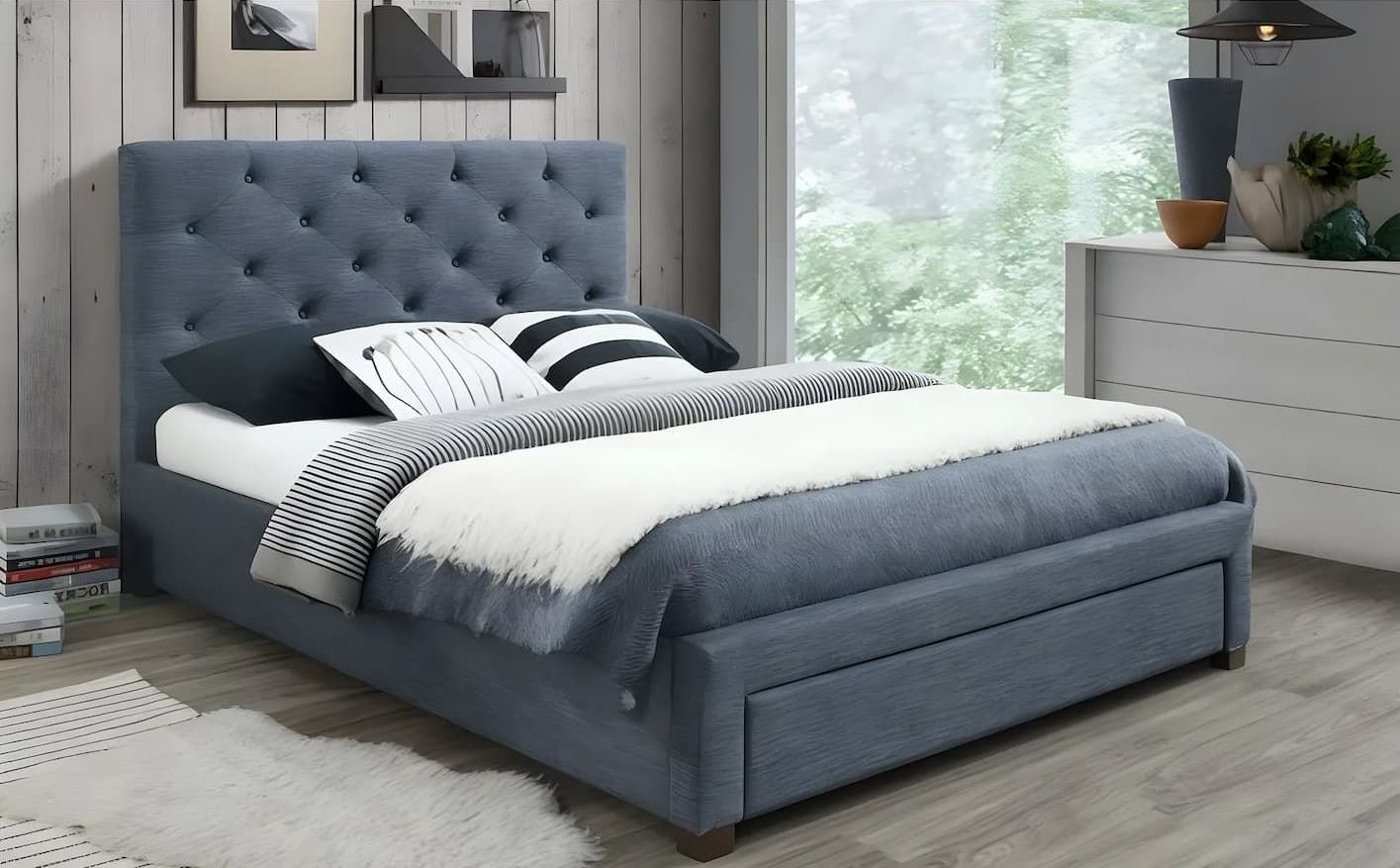 A Bed With a Tufted Headboard is Sitting in a Bedroom — Bryants Beds and Mattresses In Lismore, NSW.