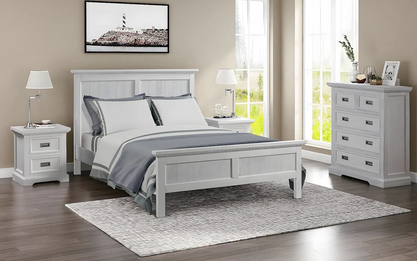 A Bedroom With a Bed, Nightstand, Dresser and Rug — Bryants Beds and Mattresses In Lismore, NSW