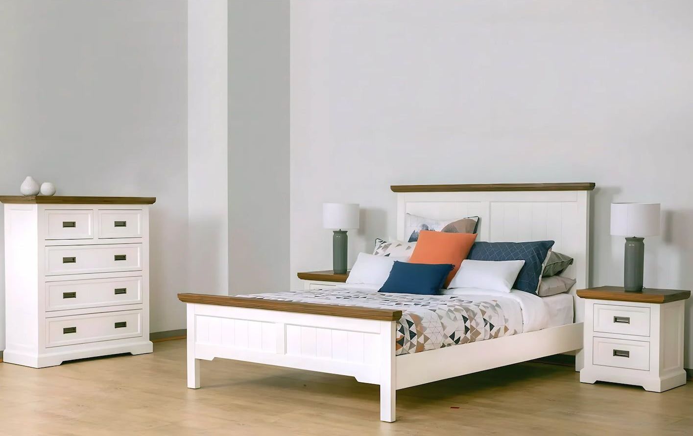 A Bedroom With a King Queen Bed and a Dresser — Bryants Beds and Mattresses In Lismore, NSW