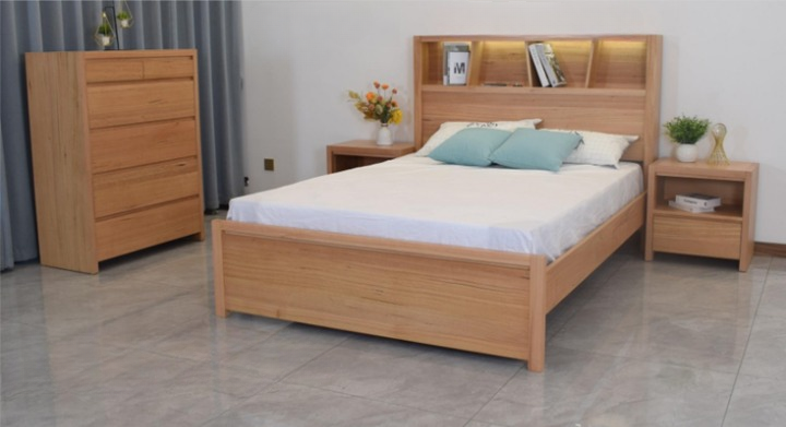 Bedroom set with a wooden bed, dresser, and nightstands.