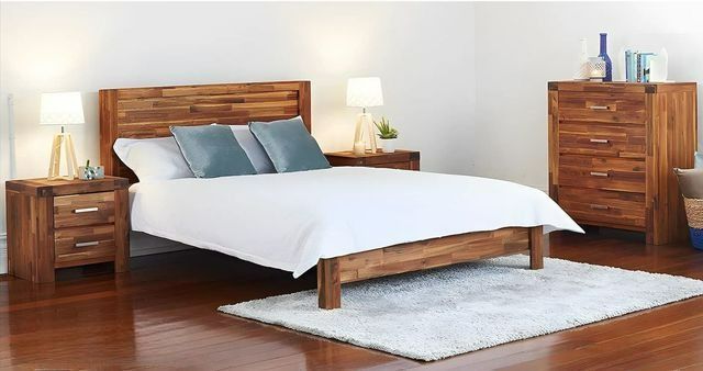 A Bedroom With a Bed, Nightstand, Dresser and Rug — Bryants Beds and Mattresses In Lismore, NSW