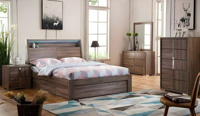 A Bedroom With a Bed Dresser Mirror and Nightstand — Bryants Beds and Mattresses In Lismore, NSW