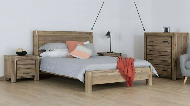 A Picture of a Bedroom With a Bed and a Dresser — Bryants Beds and Mattresses In Lismore, NSW