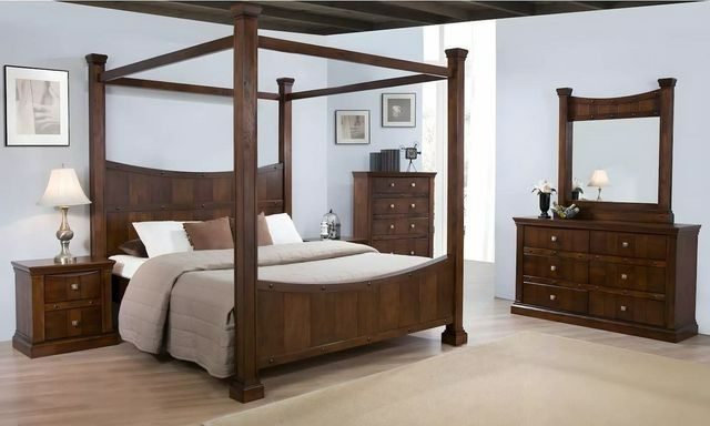 A Bedroom With a Canopy Bed Dresser and Mirror — Bryants Beds and Mattresses In Lismore, NSW