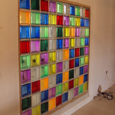 Small coloured glass brick wall installation