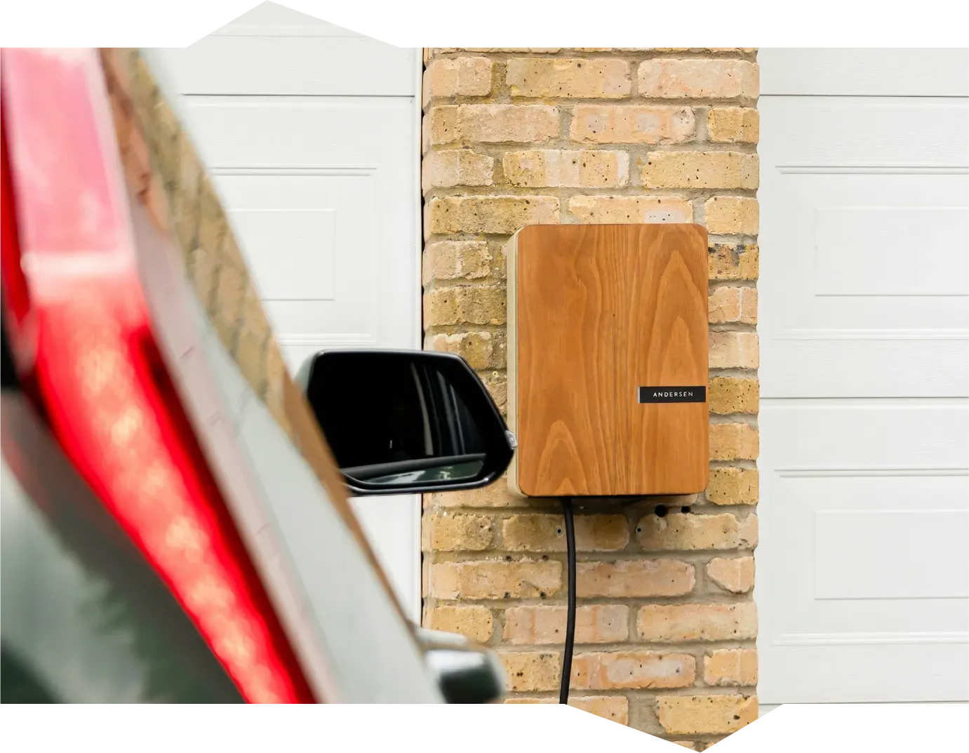 A person is opening a car door with a key.