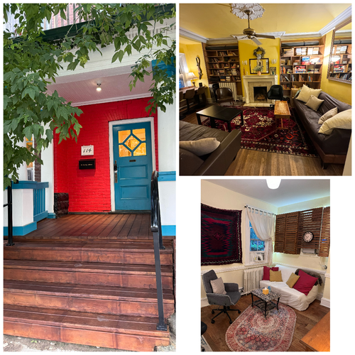 Exterior of a brightly painted house with a red wall, blue door, and interior living spaces.