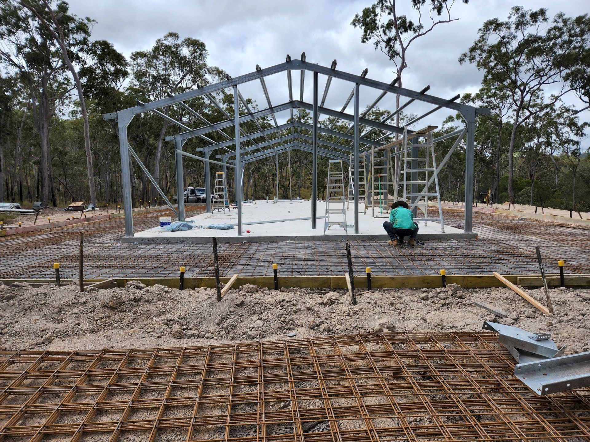 Steel Frame Building Under Construction, on a Concrete Slab — Sun Co Concrete And Construction in Dimbulah, QLD