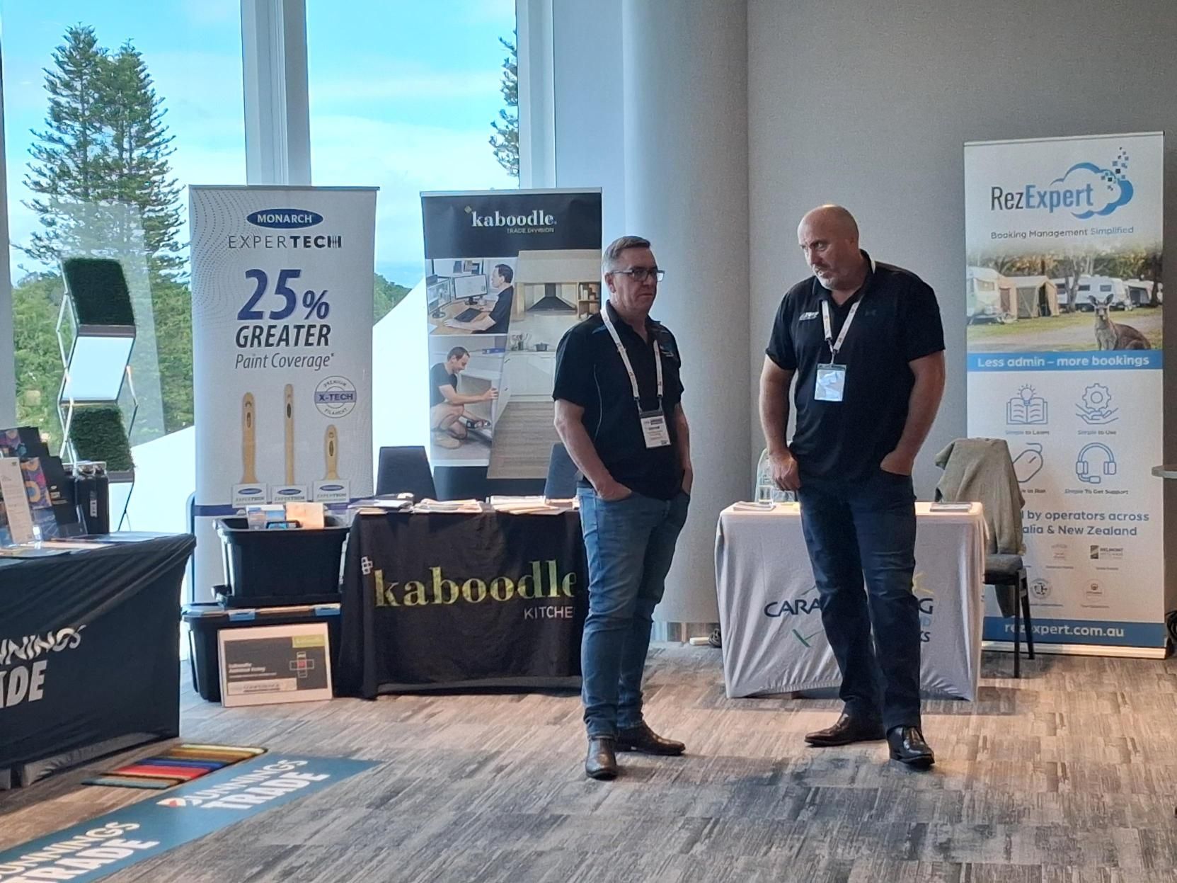 RezExpert team attending the CPAQ and CIAA National Conferences discussing accommodation industry