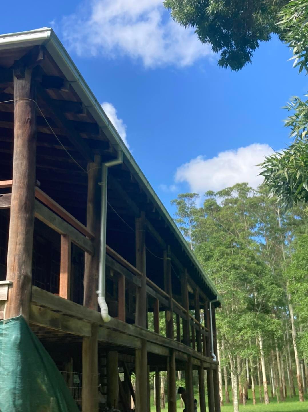 Home With Metal Downpipes — Roofing in Glendale, NSW