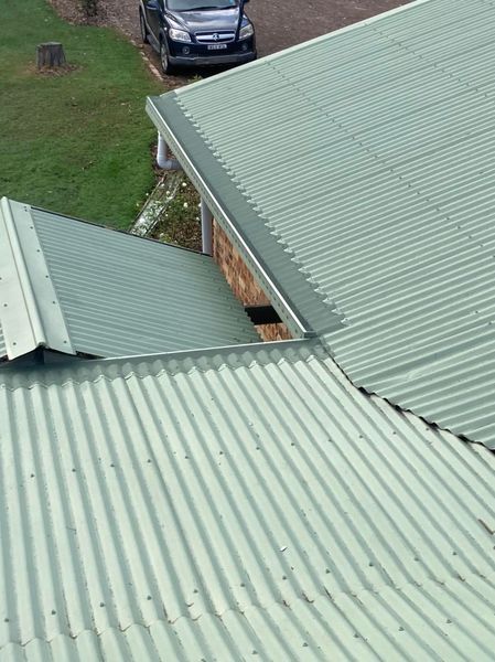 Green Metal Roof — Roofing in Glendale, NSW